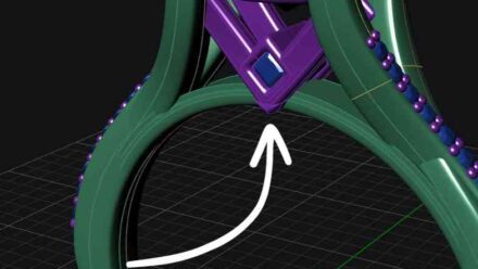 Small birthstone or something blue on engagement ring bridge