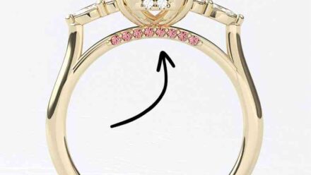 Unusual gemstones on bridge of engagement rings