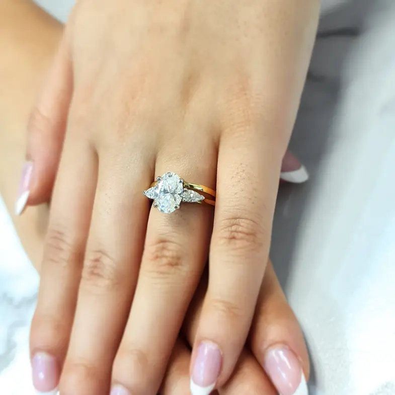Oval And Pear Three Stone Diamond Engagement Ring TR1082