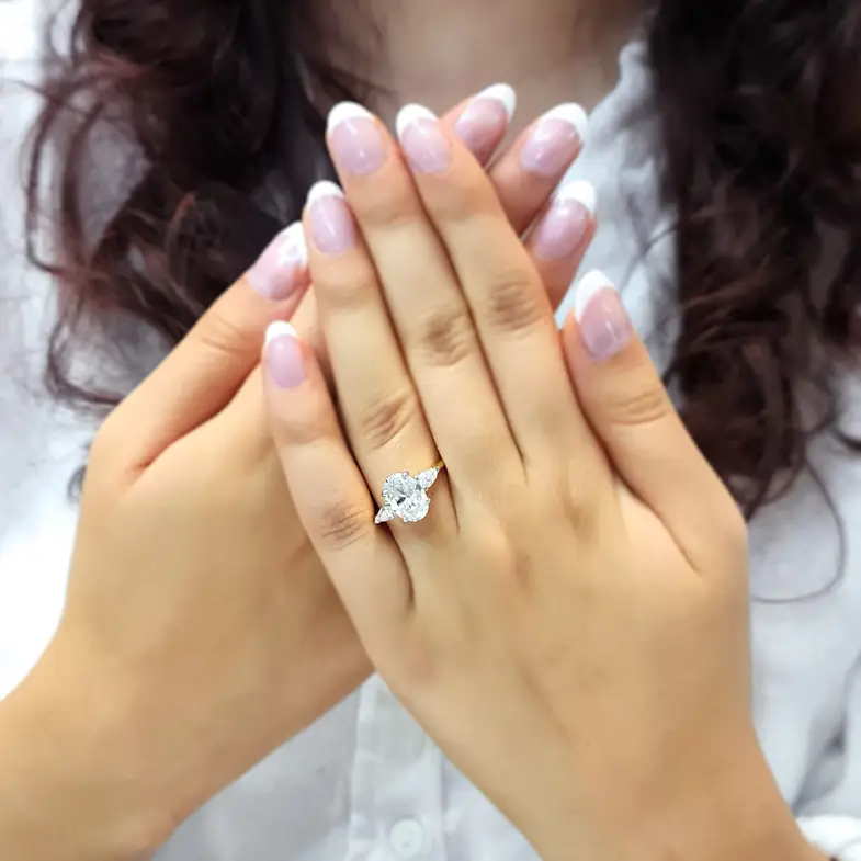 Oval And Pear Three Stone Diamond Engagement Ring TR1082