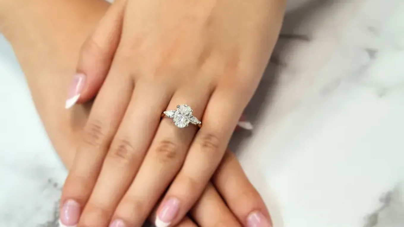 2.0ct oval and pear cut three stone diamond ring in Dublin on hand-tr1082-5