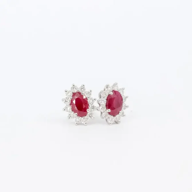Elegant 1.66ct oval ruby earrings with a diamond halo in Diana style