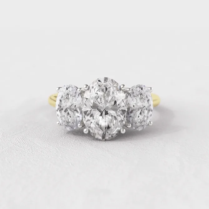 3 oval diamond engagement rings in yellow gold tr1083