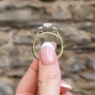 Oval and half moon diamond engagement ring in yellow gold side vide on hand-tr1095