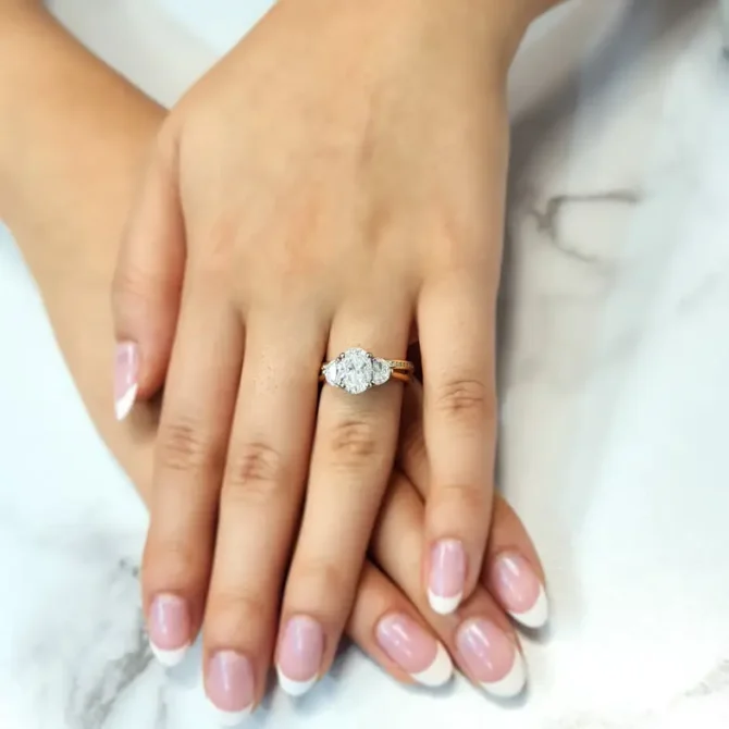Oval and half moon lab grown diamond ring on hand-tr1095-2