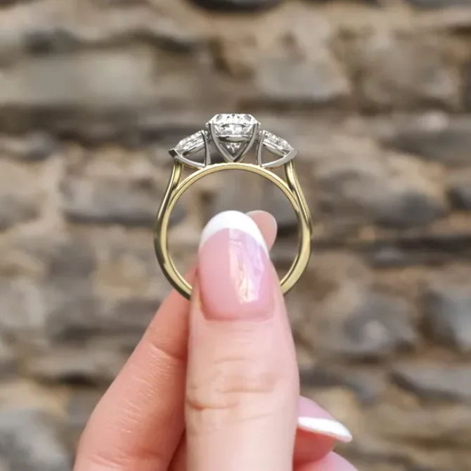 Oval and pear cut diamond engagement ring in yellow gold tr1082 look-through view