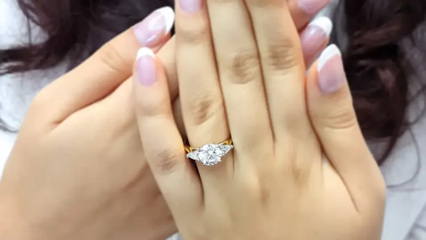 Round and pear cut lab grown diamond engagement ring from Dublin jewellers on hand - tr1094-2