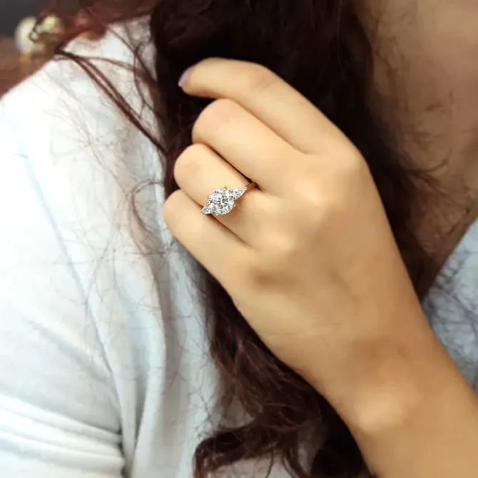 Round and pear cut lab grown diamond engagement ring from Dublin jewellers on hand - tr1094-3