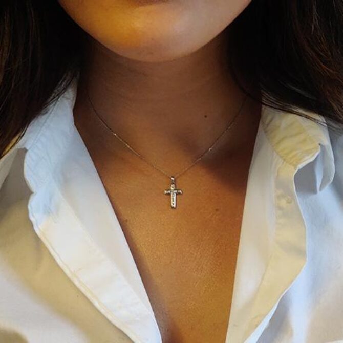 pn065 diamond cross pendant on model commins and co jewellers image 1