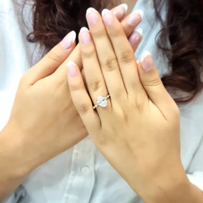 certified lab grown oval shape diamond engagement ring with invisible halo on hand-pr1022-3