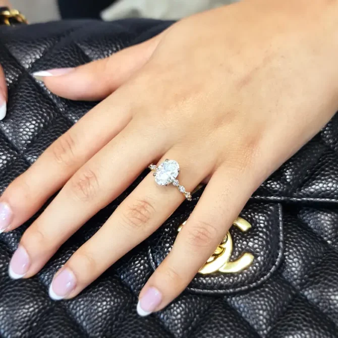 certified lab grown oval shape diamond engagement ring with invisible halo on hand-pr1022-6