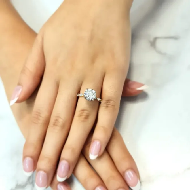 round brilliant cut diamond on hand with invisible halo and marquise diamonds on band - made in Ireland-pr1044-1