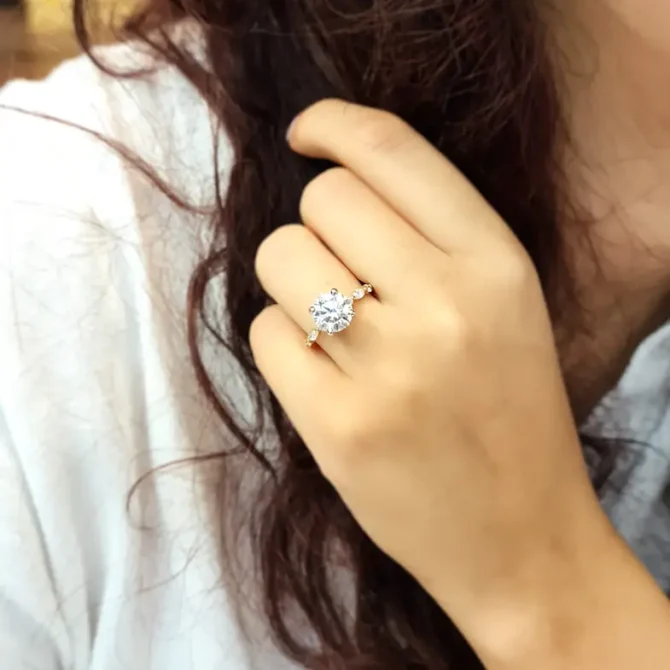 round brilliant cut diamond on hand with invisible halo and marquise diamonds on band - made in Ireland-pr1044-2