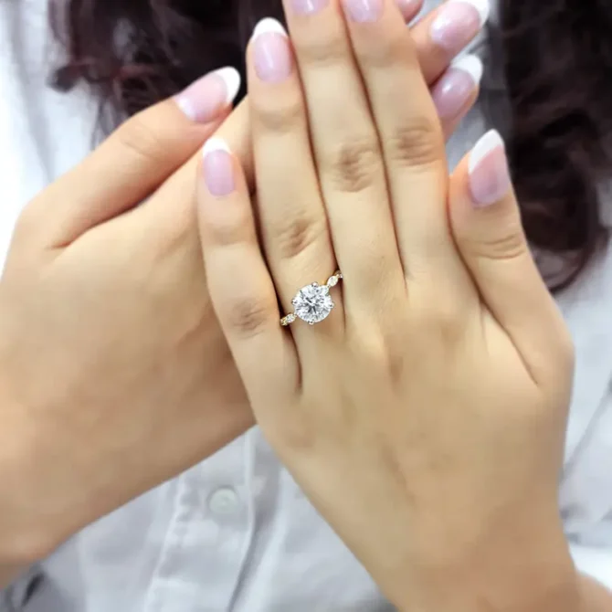 round brilliant cut diamond on hand with invisible halo and marquise diamonds on band - made in Ireland-pr1044-3