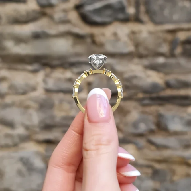 round cut diamond ring with marquise diamonds on band with invisible halo in yellow gold side view pr1044 - Made in Dublin, Ireland