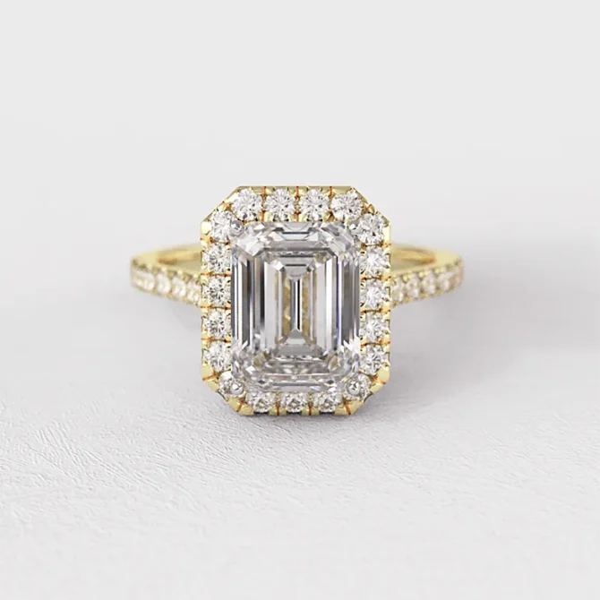 Claw set diamond engagement ring in yellow gold VR1104