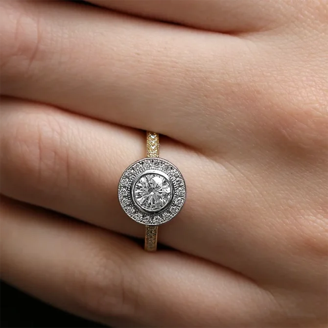 Besel set halo engagement ring in yellow gold on hand VR1111