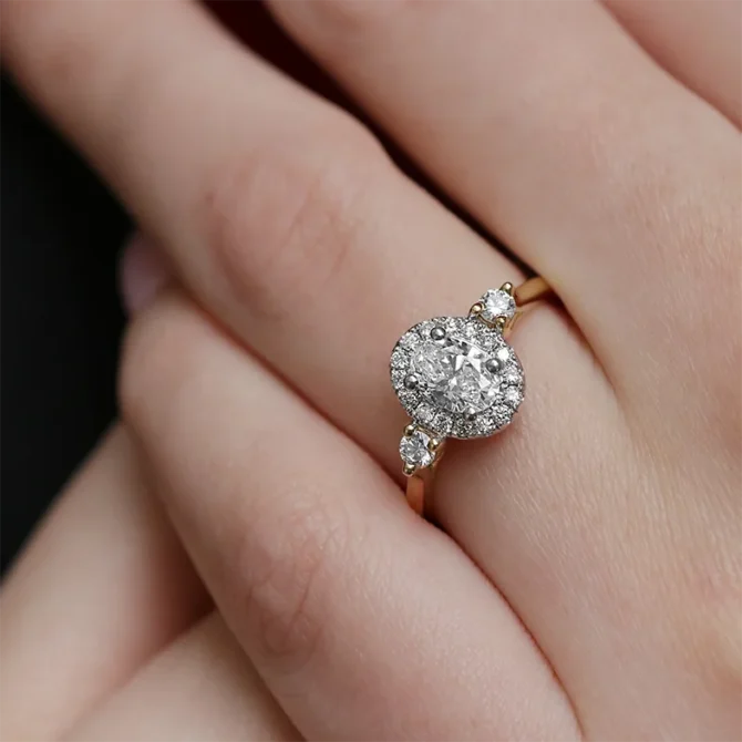 Oval halo with round diamond on side on hand -vr1100