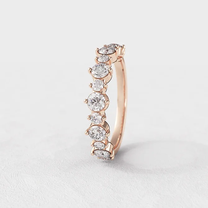 Graduating diamond set ladies ring in rose gold sb3700