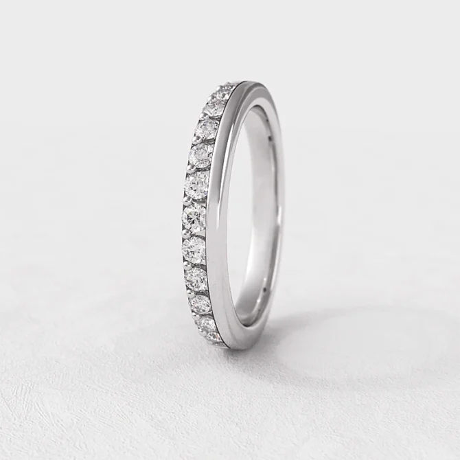 Claw set and plain diamond set ladies ring in white gold sb4019