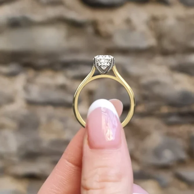 hand image hidden halo oval cut diamond ring sr1092 yellow gold. Made in Dublin, Ireland