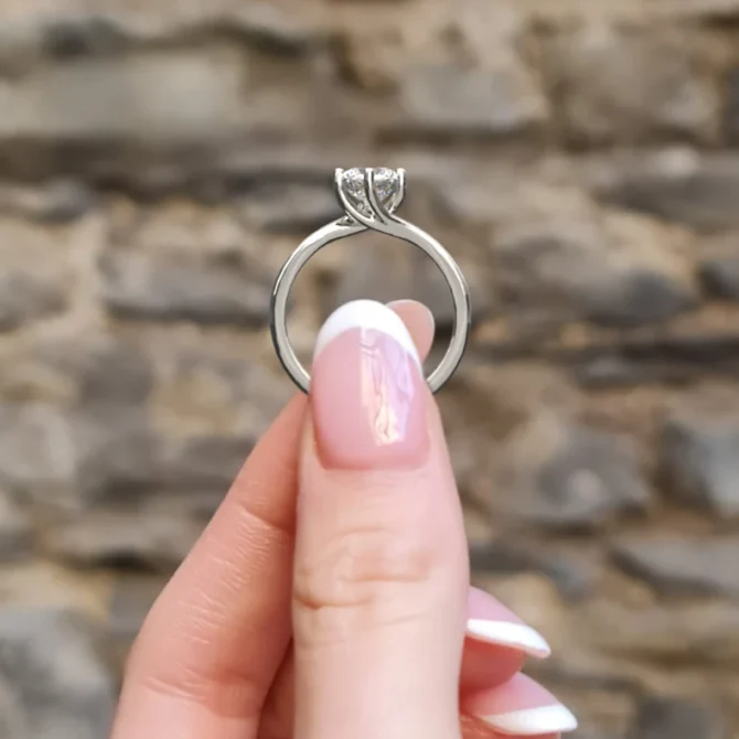 six claw twist style solitaire engagement ring in white gold side view-sr1062