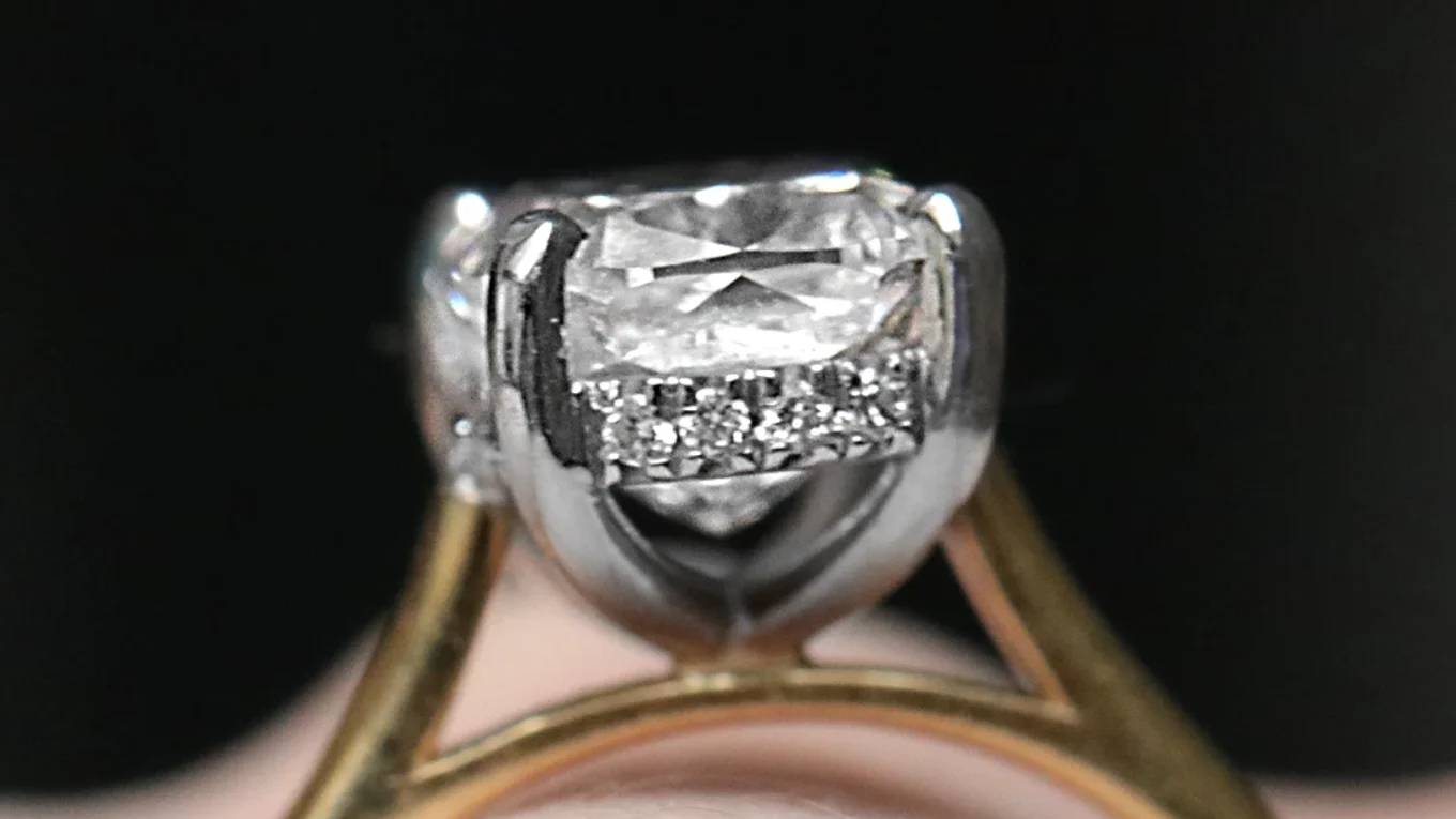 Cushion Cut Invisible Halo Engagement Ring SR1099 on hand side view