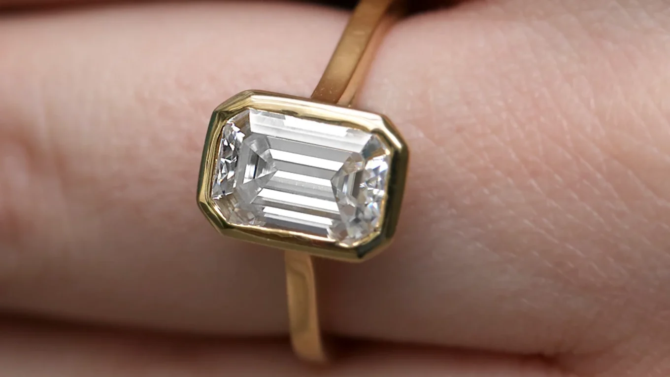 2.0ct Emerald Cut Bezel Set Solitaire Engagement Ring SR1097 on hand close up