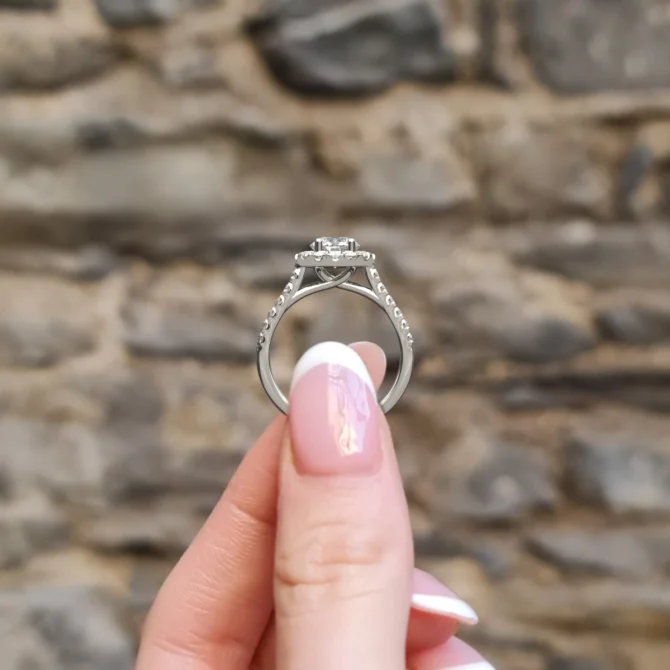 hand image vr1088 claw set halo engagement ring