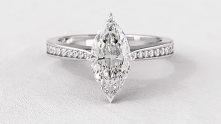 Marquise Side Stone Engagement Rings