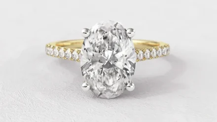 Oval Side Stone Engagement Rings
