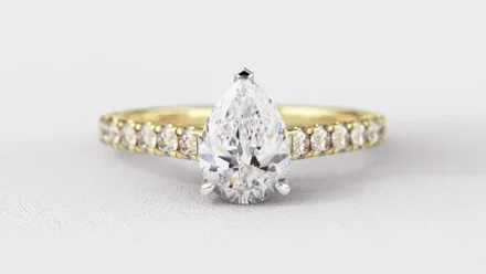 Pear Side Stone Engagement Rings