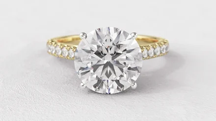 Round Side Stone Engagement Rings