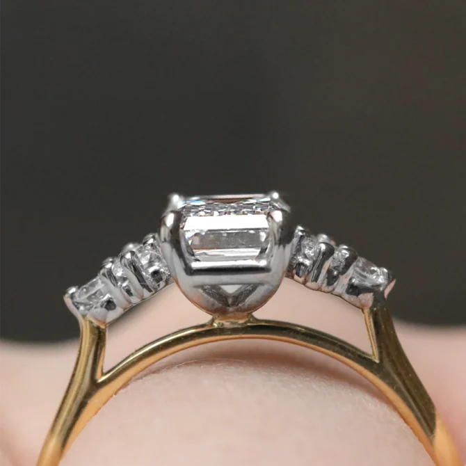 1.76ct Emerald Cut Side Stone Engagement Ring PR1087 on hand side view
