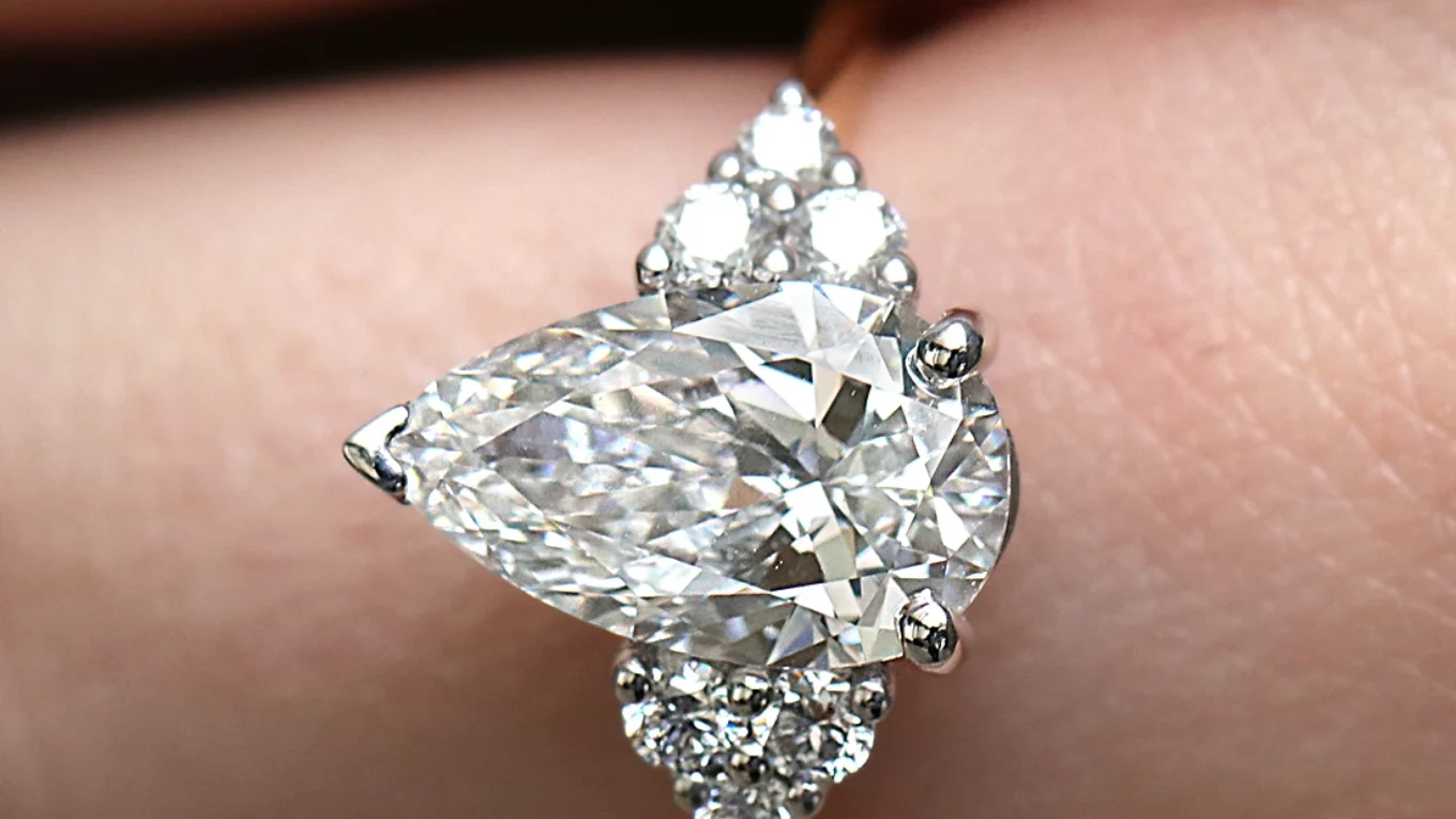 2.20ct Pear Cut Side Stone Engagement Ring PR1090 in yellow gold on hand