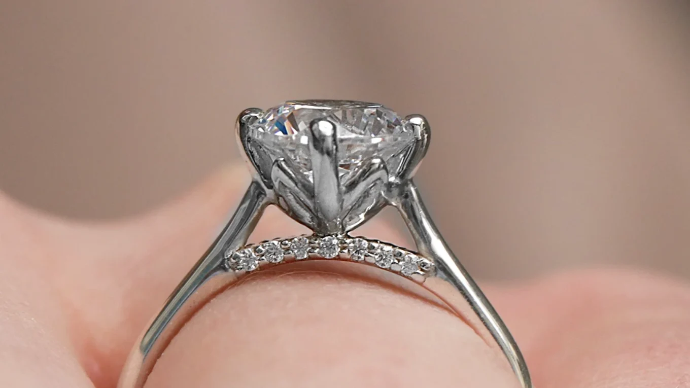 Round Cut Engagement Ring With Diamond Bridge SR1020 on hand side view