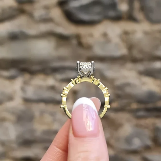 hand holding engagment ring pr1086 yellow gold