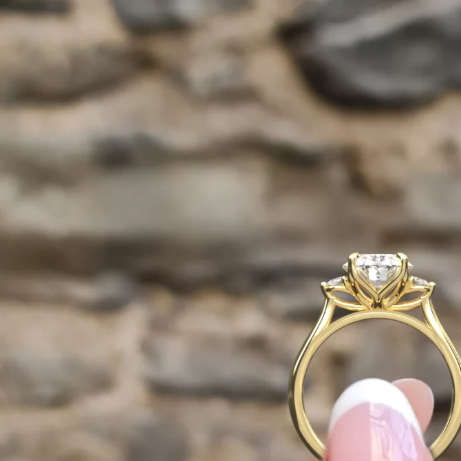 oval cut trilogy engagement ring tr1102 hand image