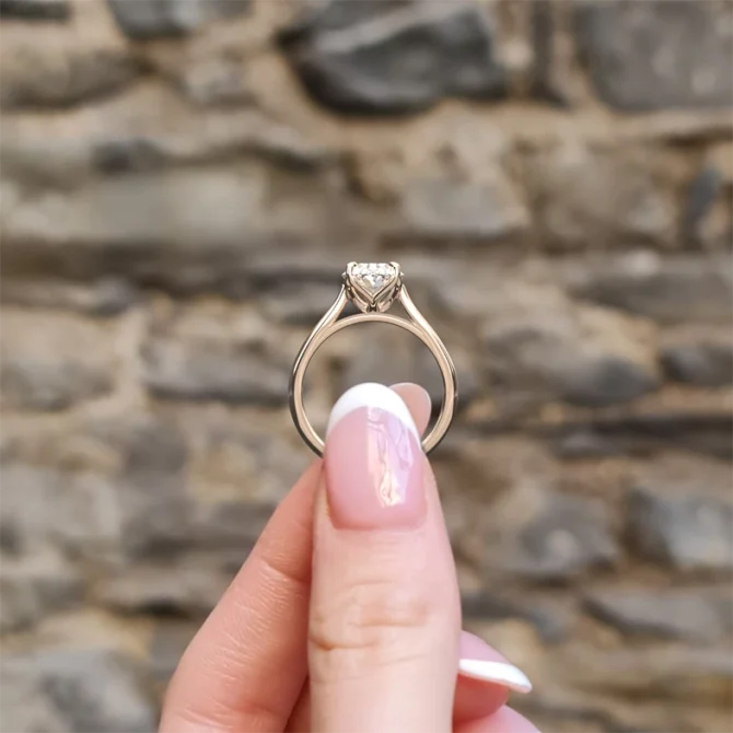 Classic lotus style oval solitaire diamond ring sr1043 in rose gold side view