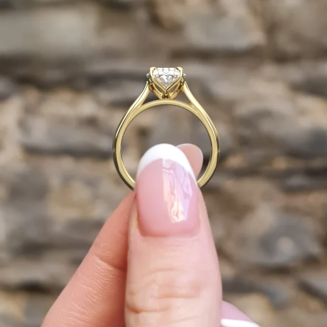 Classic lotus style oval solitaire diamond ring sr1043 in yellow gold side view