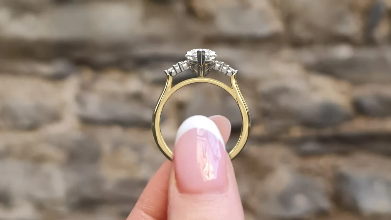 Pear cut side stone ring with baguette side diamond in white gold pr1095 yellow gold side view