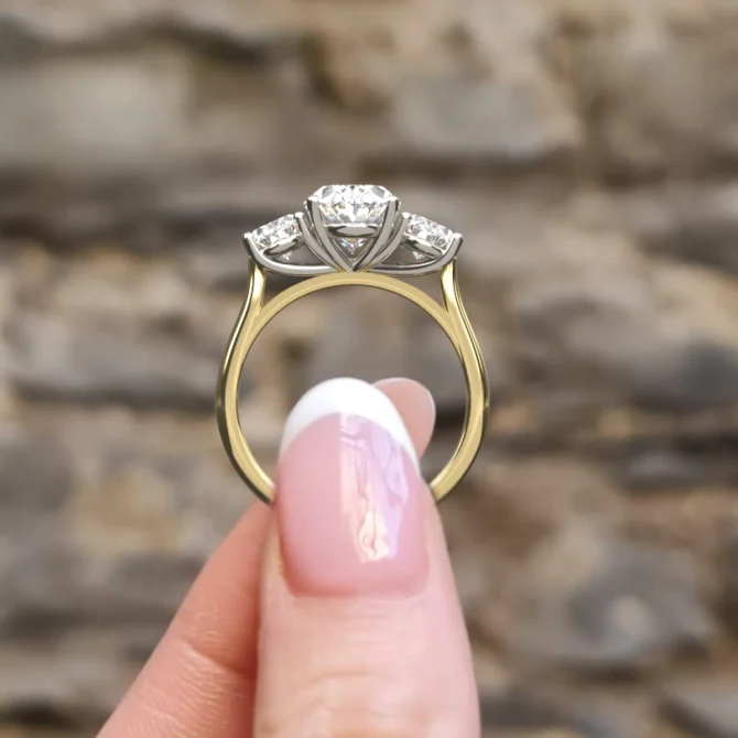 Yellow gold oval trilogy diamond ring tr1101 Side View