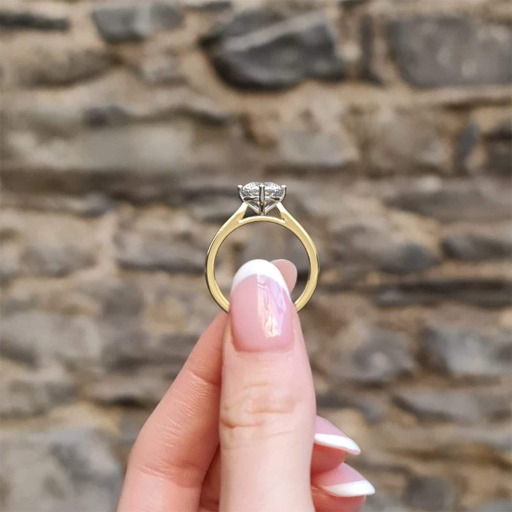 Compass set solitaire diamond ring sr1059 1.5ct yellow gold side view in hand