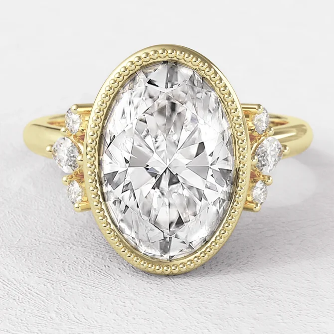 Milgarin vintage style besel set oval diamond ring pr13987 feature image yellow gold